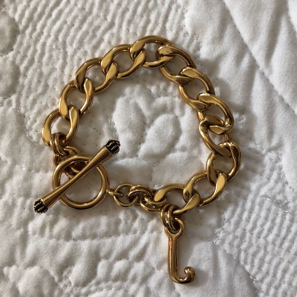 Gold Juicy Couture chain link bracelet.